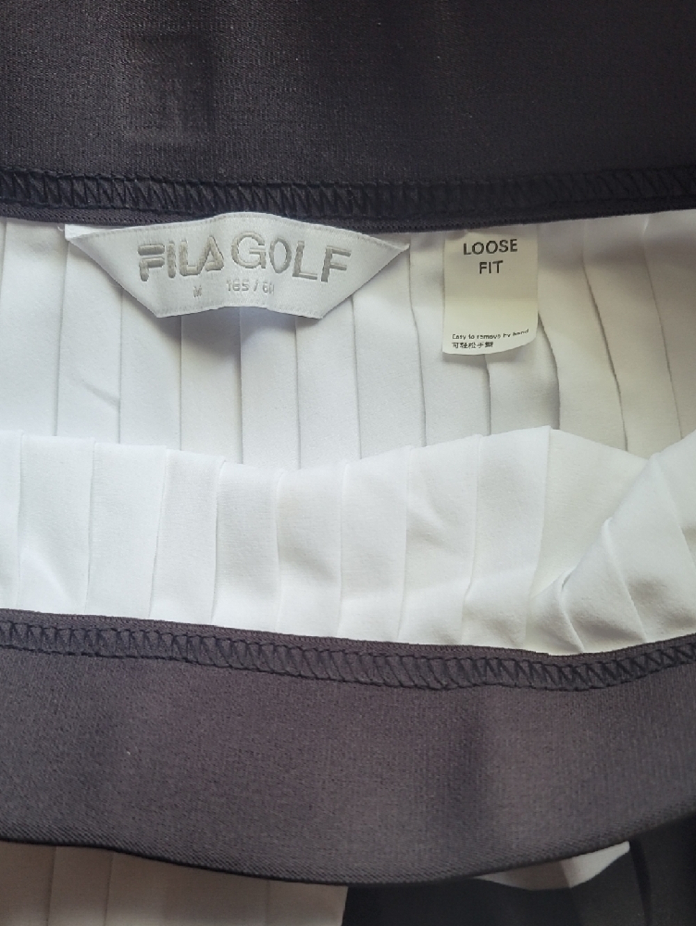 Fila White and Black Pleated Skater Skirt with Branded Waistband - Picture 2 of 4